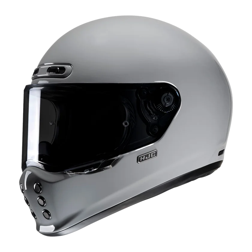 HJC V10 integraalhelm in grijs met retro styling, lichtgewicht glasvezel schaal, ventilatiesysteem en voorbereid op Bluetooth. Comfortabel en stijlvol.